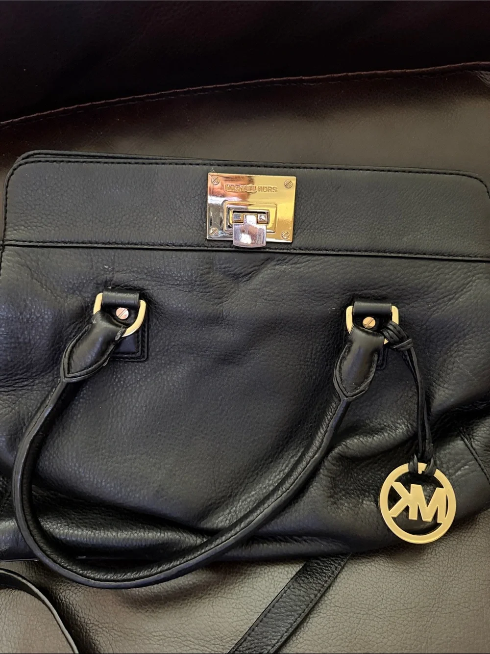 Michael Kors Black Leather Satchel with Gold Accents